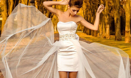 Interpretación de soñar con probarse un vestido blanco.